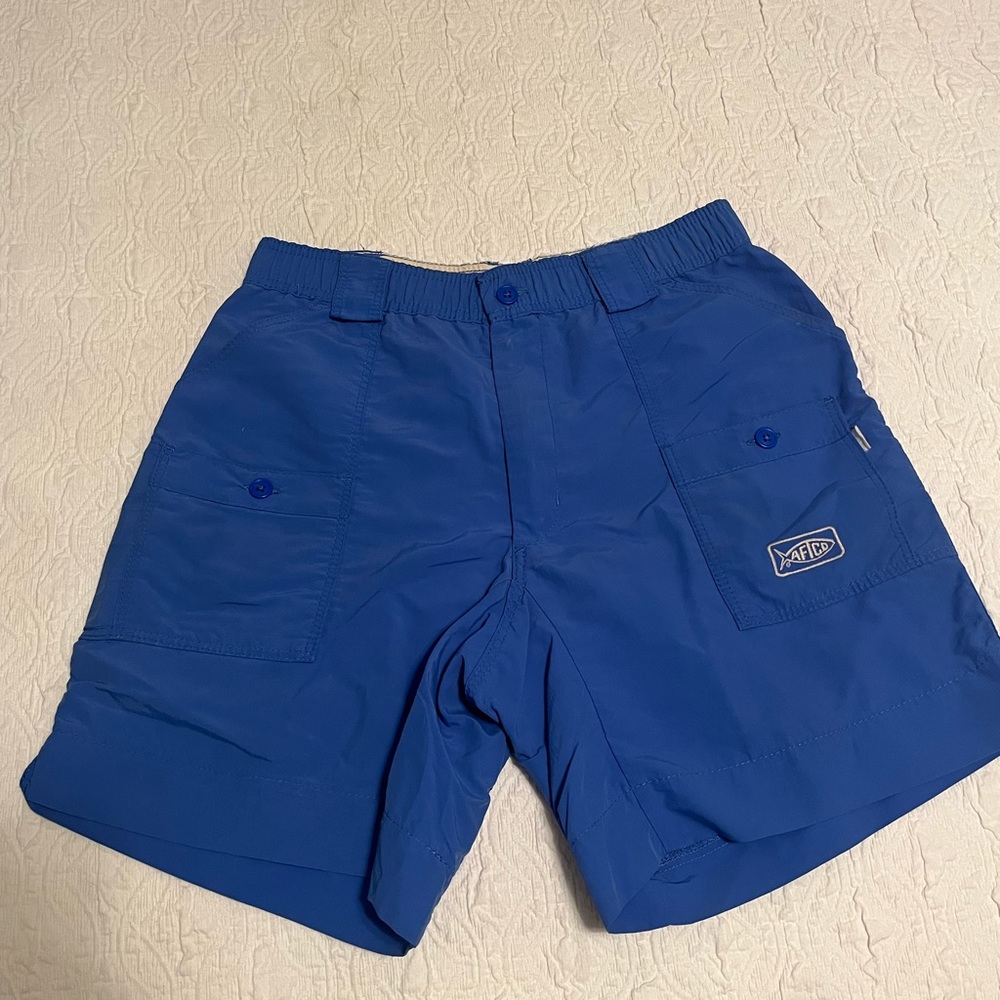 AFTCO Men’s Shorts. Royal blue color. 7” inseam. Size - 28.